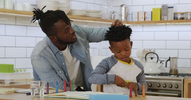 Father Helping Son with Homework in Modern Kitchen - Download Free Stock Images Pikwizard.com