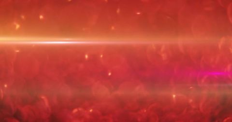 Vibrant red abstract background with light streaks and bokeh