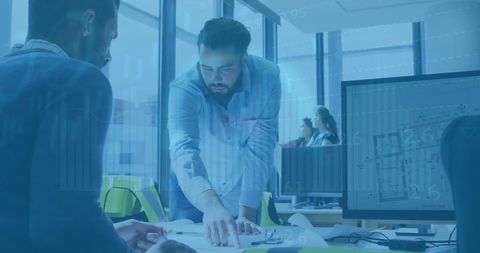 Collaboration in Modern Business Office with Digital Financial Overlay