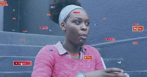 Woman Sitting with Drink Among Floating Social Media Icons