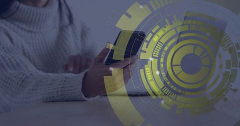 Woman using smartphone and laptop with futuristic hud overlay for digital security