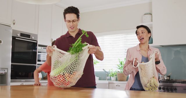 Family Unpacking Groceries in Modern Kitchen - Download Free Stock Images Pikwizard.com