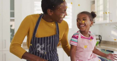 Mother and Daughter Baking Together with Joy at Home Kitchen