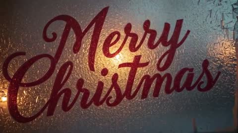 Merry Christmas decal glowing on frosted glass window with warm backlight and script