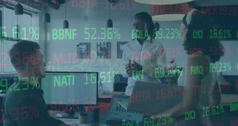 Diverse Team Discussing Stock Market Data in Vibrant Office Atmosphere