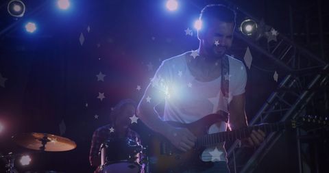 Energetic Live Band with Flag Overlay Celebrating Patriotism - Download Free Stock Images Pikwizard.com