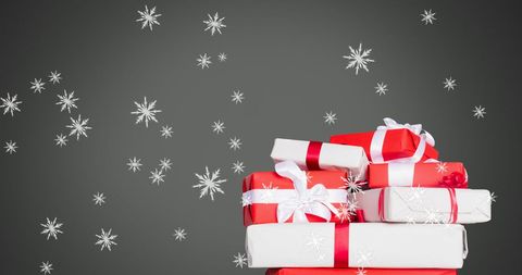 Festive Red and White Gift Boxes with Snowflakes on Gray