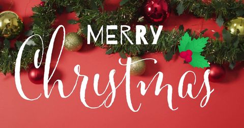 Festive Merry Christmas Text with Decorative Baubles and Holly