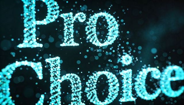 Glowing pro-choice typography forming from cyan particles with bokeh light effect