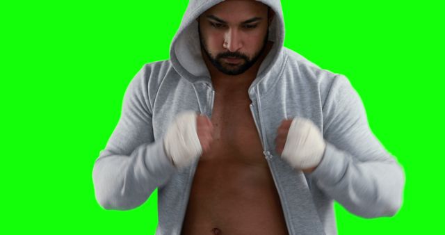 Focused Boxer Training with Hoodie Against Green Screen - Download Free Stock Images Pikwizard.com