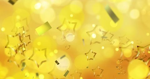 Golden Stars and Confetti on Blurred Yellow Lights Background