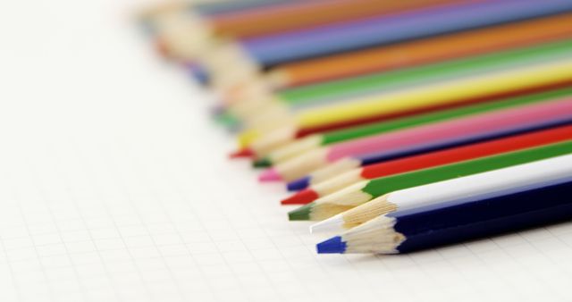 Close-Up of Vibrant Colored Pencils Lined Up on White Background - Download Free Stock Images Pikwizard.com