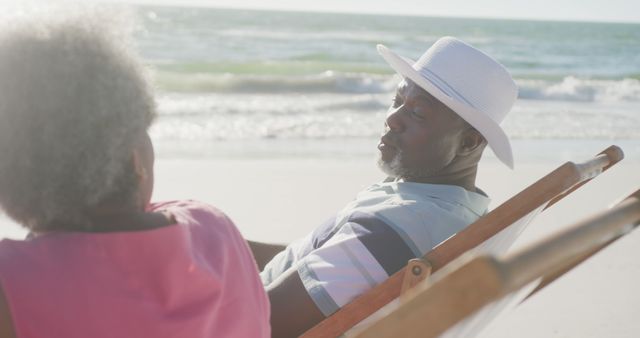 Senior African American Couple Relaxing at the Beach - Download Free Stock Images Pikwizard.com