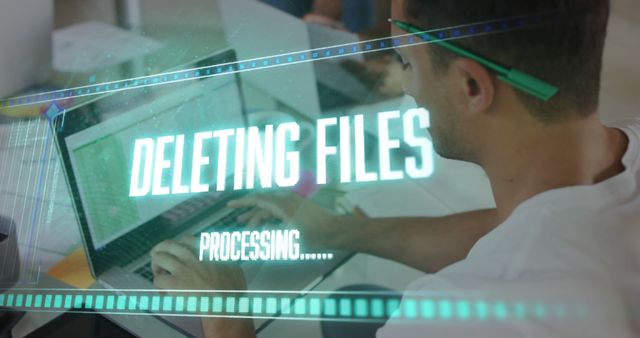 Young Professional Deleting Files from Laptop - Download Free Stock Images Pikwizard.com