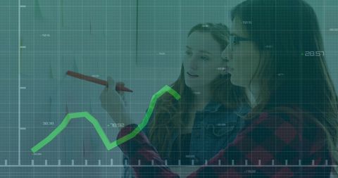 Business Professionals Analyzing Growth Data on Transparent Screen