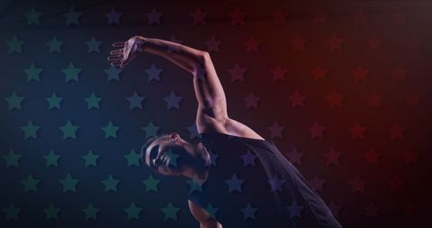 Caucasian Man Stretching Under Starry Night Sky