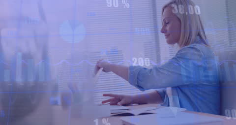 Businesswoman Analyzing Digital Data in Modern Office Environment