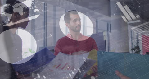 Business Professionals Analyzing Data with Financial Overlay