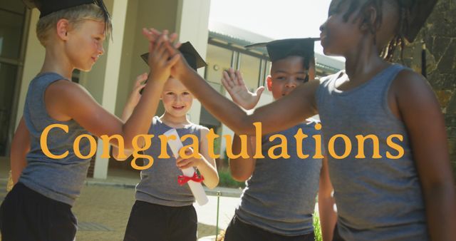 Diverse Group of Children Celebrating Outside with Congratulations Sign - Download Free Stock Images Pikwizard.com