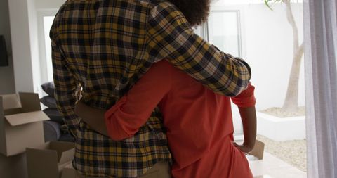 Happy Couple Embracing in New Home After Moving - Download Free Stock Images Pikwizard.com
