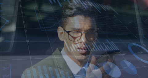 Business Professional Analyzing Financial Data with Futuristic Interface