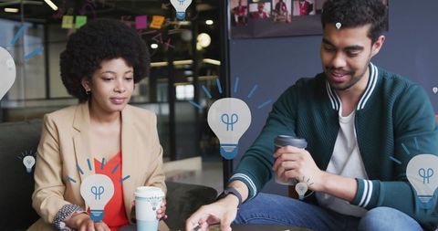 Diverse business colleagues discussing innovative ideas