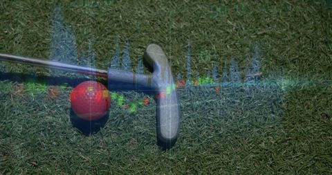 Red Golf Ball and Silver Putter on Green with Translucent Sound Wave Graphic