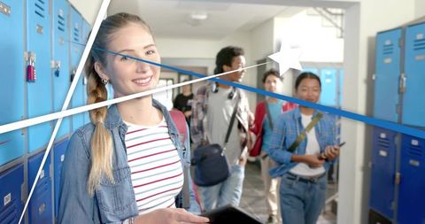 Smiling blonde teen holding tablet walking through high school hallway with blue lockers
