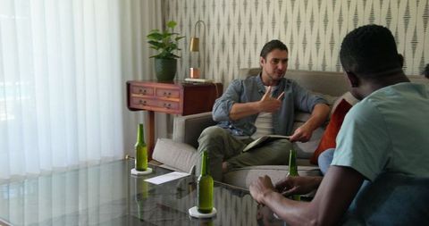 Friends Relaxing in Cozy Living Room Enjoying Conversation