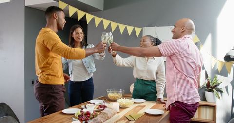 Friends Celebrating Birthday Party with a Toast