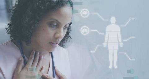 Biracial Female Doctor Analyzing Digital Medical Data Interface