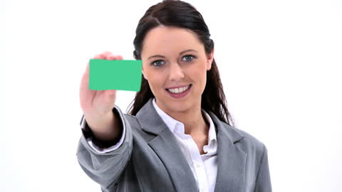 Confident Professional Woman Displaying Business Card
