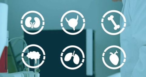 Medical icons overlay with doctor in laboratory