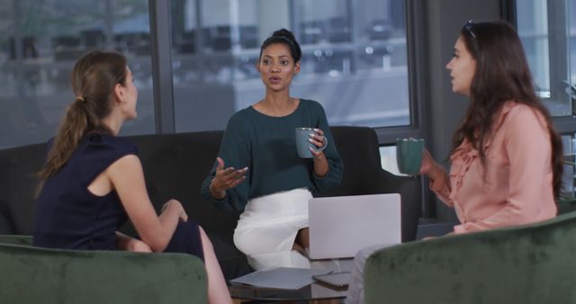 Diverse group of women discussing business in modern office - Download Free Stock Images Pikwizard.com