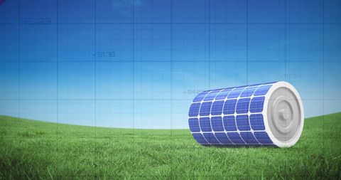 Renewable Energy Concept: Solar Battery on Grassy Field