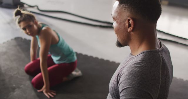 Personal Trainer Motivating Woman During Workout in Gym - Download Free Stock Images Pikwizard.com