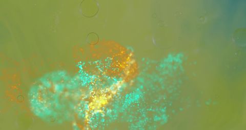 Abstract liquid color flow with green background