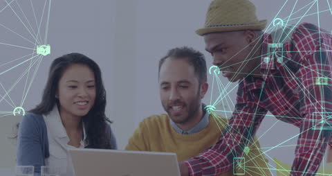 Diverse Team Analyzing Digital Network on Laptop