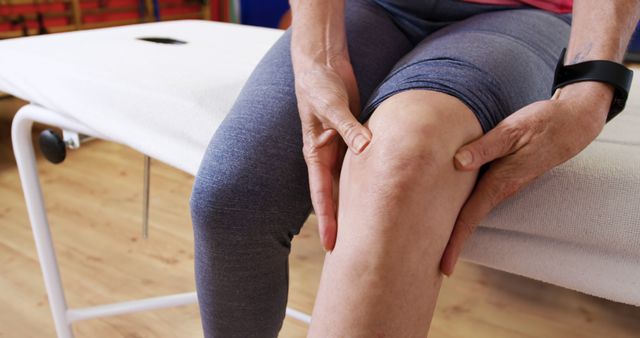 Caucasian woman experiencing knee pain, with copy space - Download Free Stock Photos Pikwizard.com
