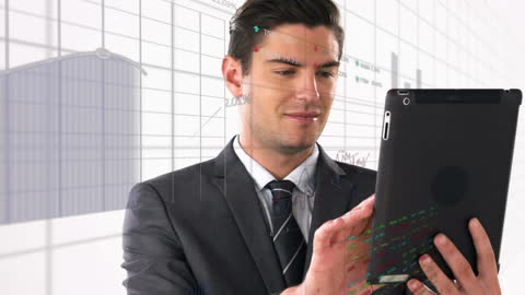 Businessman Analyzing Digital Financial Data on Tablet