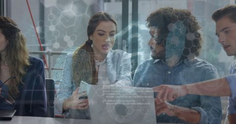 Diverse team analyzing cyber security solutions in modern office