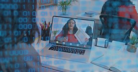Remote presenter holding documents during video conference with digital binary overlay