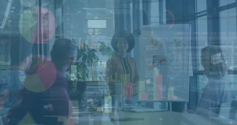 Diverse Business Team Analyzing Data Visualization in Modern Office