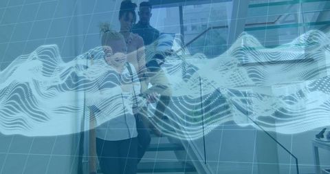 Innovative Team Walking Down Stairwell with Digital Wave Overlay