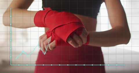 Woman Wrapping Hands with Fitness Data Overlay