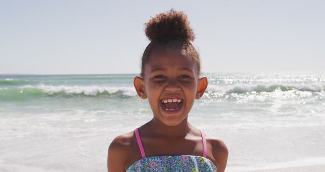 Joyful Young Girl Smiling at Sunny Beach - Download Free Stock Images Pikwizard.com