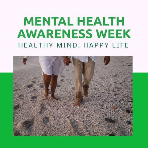 Biracial couple walking on beach for mental health awareness