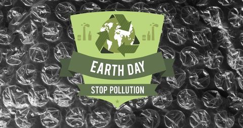 Earth Day Recycling Symbol on Pollution Image