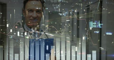 Doctor Analyzing Financial Charts in Modern Clinic