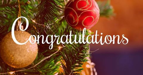 Festive christmas decorations with baubles and warm lights